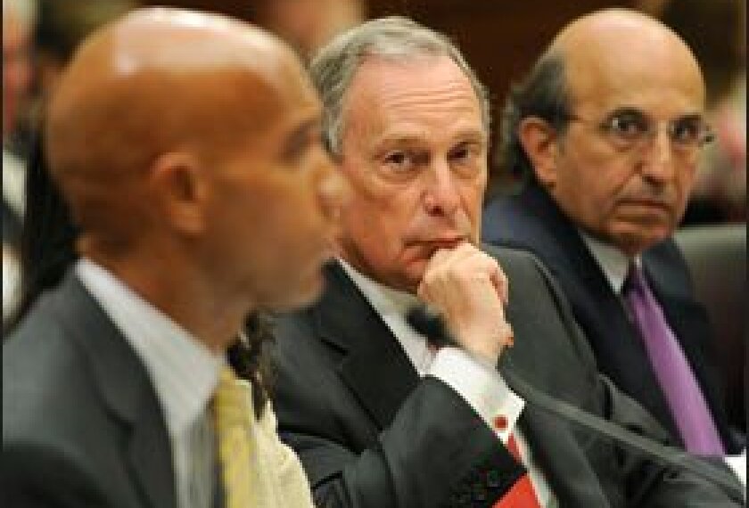 New York City Mayor Michael R. Bloomberg, center, and New York City Schools Chancellor Joel I. Klein, right, listen as Washington Mayor Adrian M. Fenty testifies before the House Education and Labor Committee this month on the need for a process to develop national academic-content standards.