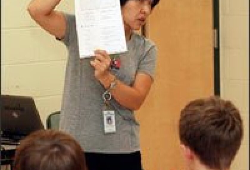 Meishan Spradlin combines face-to-face teaching and videoconferencing to expand her reach as a Chinese-language teacher in Hall County, Ga.