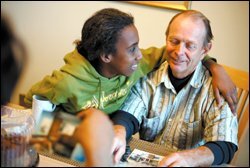 After nearly two months apart, Holly Sweeney and her father, Steven Kinney, spend time together in an apartment in Virginia she shares with her mother, Schondra Sweeney.