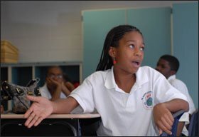 Najah Smith, a 6th grader at King, speaks up during class.