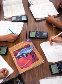 Students in Ginger Holt's geometry class in Mount Pleasant High's Tiger Academy study in small groups last month for their final exam. The class runs for two consecutive periods daily.
